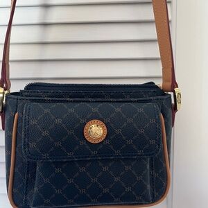 Rioni cross-body Navy bag with tan trim/strap.